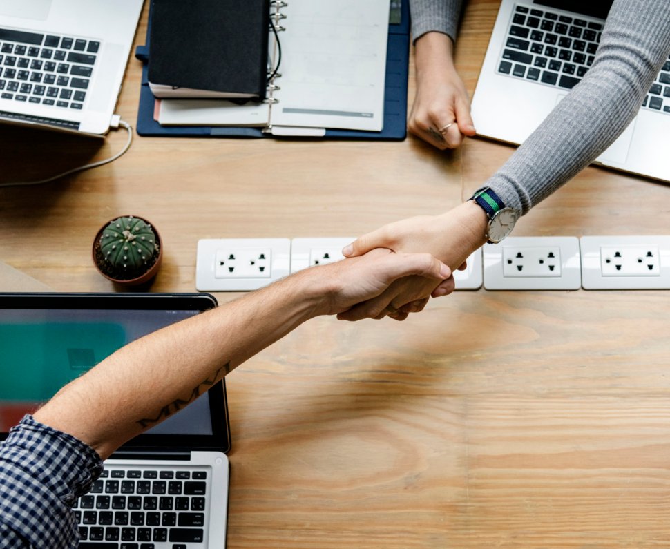 Business people shaking hands in agreement